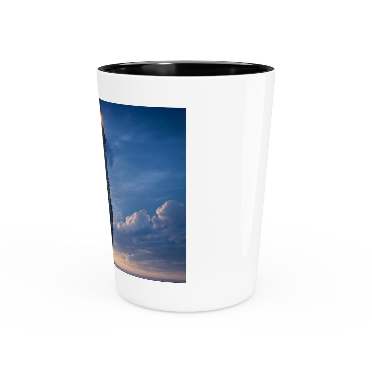 Skyborne Lighthouse Shot Glass – Warm Light Against the Azure Expanse