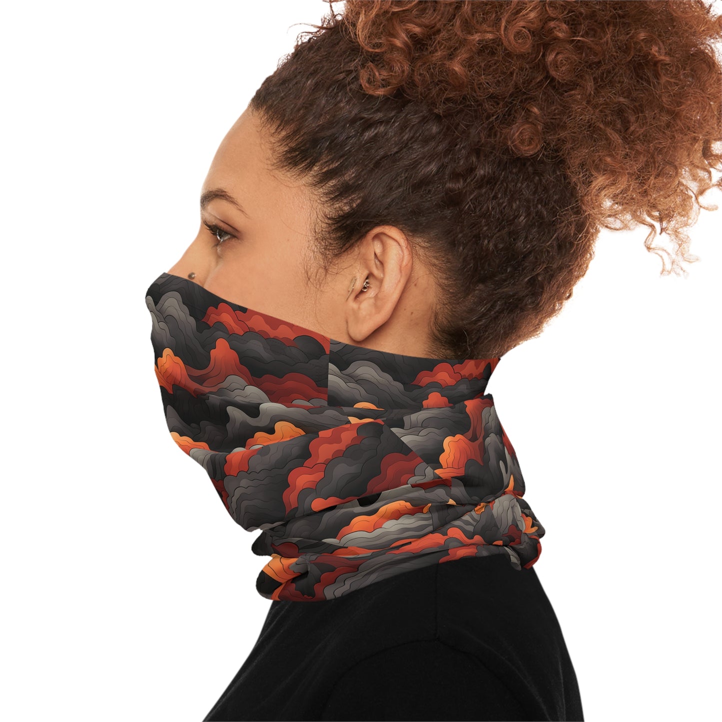 "A bold tiling pattern of angular, zig-zagging lines suggesting flames in red and orange tones overlaid on clouds of gray and black smoke" - Lightweight Neck Gaiter