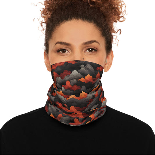 "A bold tiling pattern of angular, zig-zagging lines suggesting flames in red and orange tones overlaid on clouds of gray and black smoke" - Lightweight Neck Gaiter