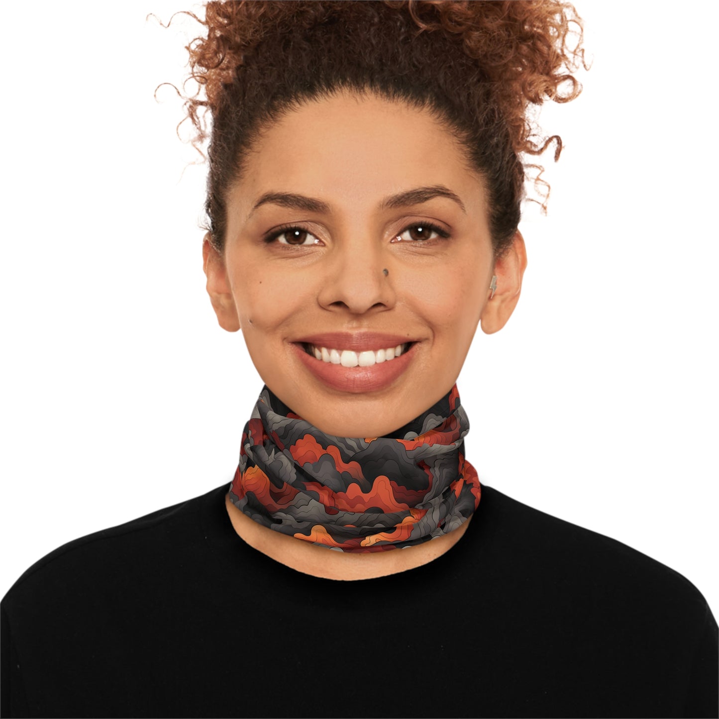 "A bold tiling pattern of angular, zig-zagging lines suggesting flames in red and orange tones overlaid on clouds of gray and black smoke" - Lightweight Neck Gaiter