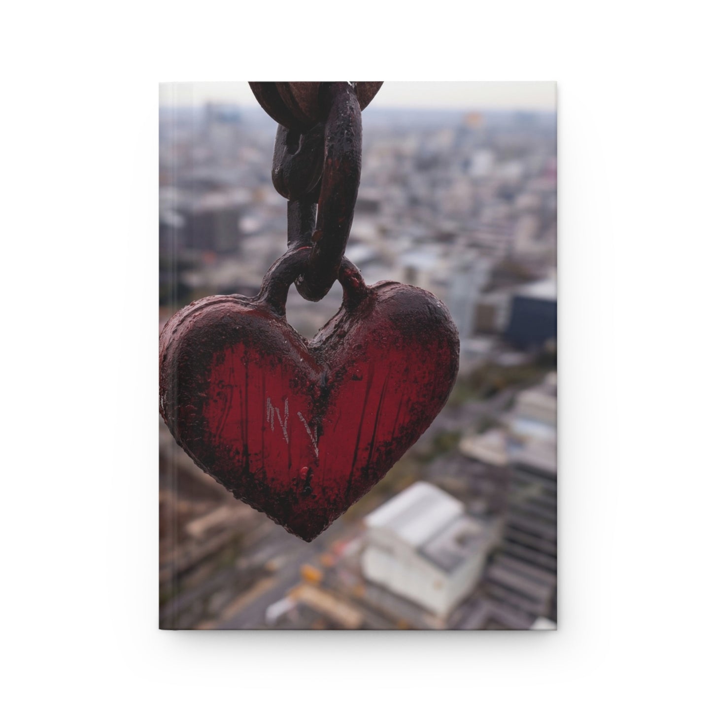 Rusty Heart Weight Journal – Suspended Above the Cityscape