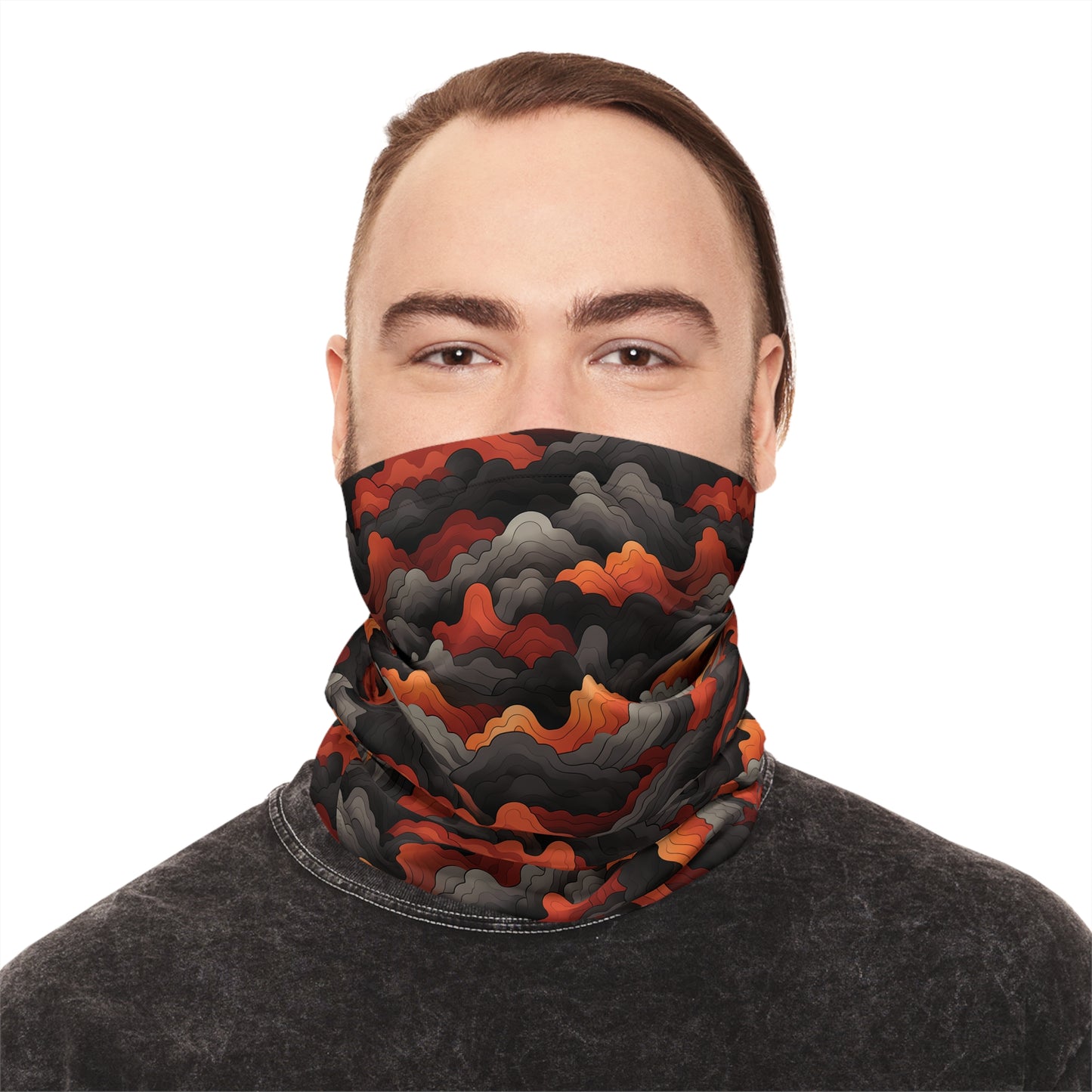 "A bold tiling pattern of angular, zig-zagging lines suggesting flames in red and orange tones overlaid on clouds of gray and black smoke" - Lightweight Neck Gaiter