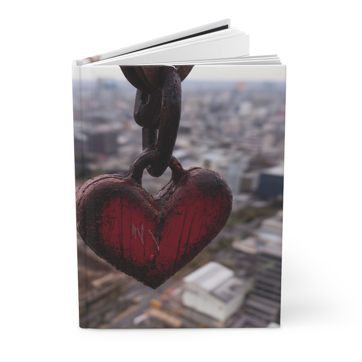 Rusty Heart Weight Journal – Suspended Above the Cityscape