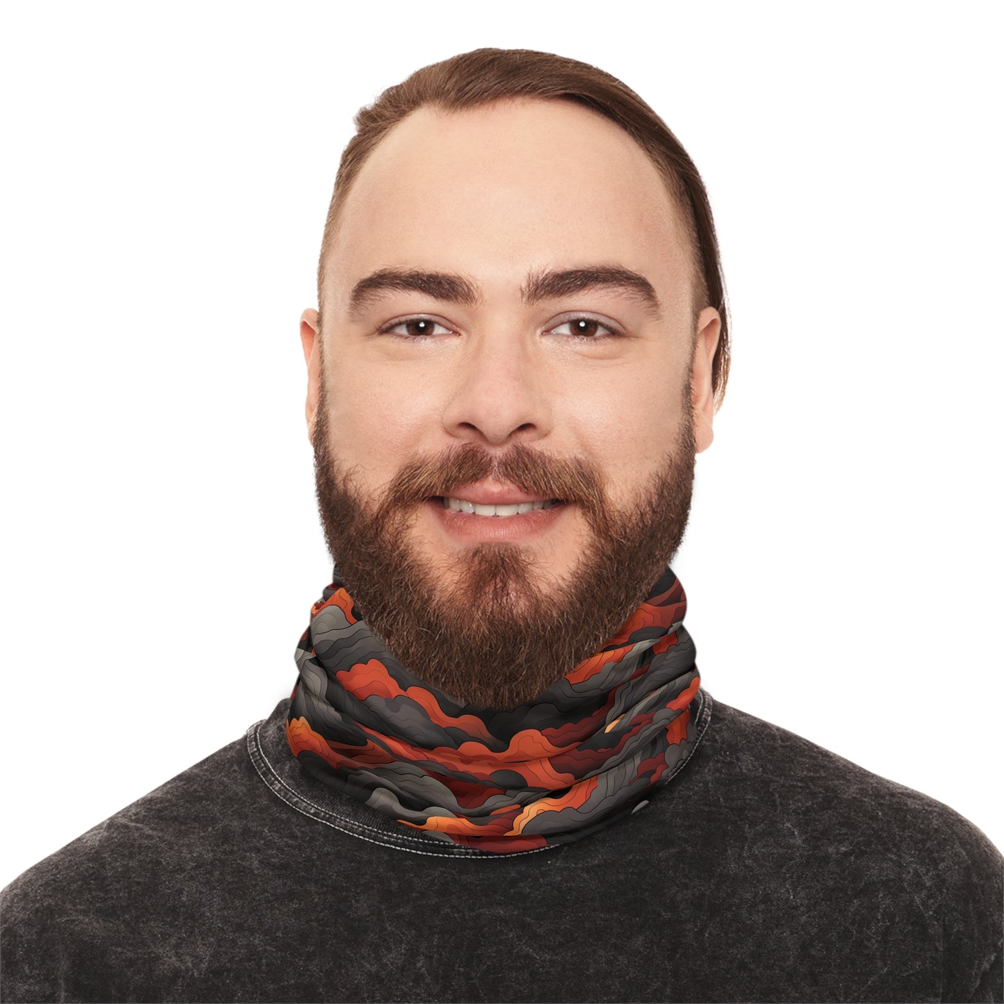 "A bold tiling pattern of angular, zig-zagging lines suggesting flames in red and orange tones overlaid on clouds of gray and black smoke" - Lightweight Neck Gaiter