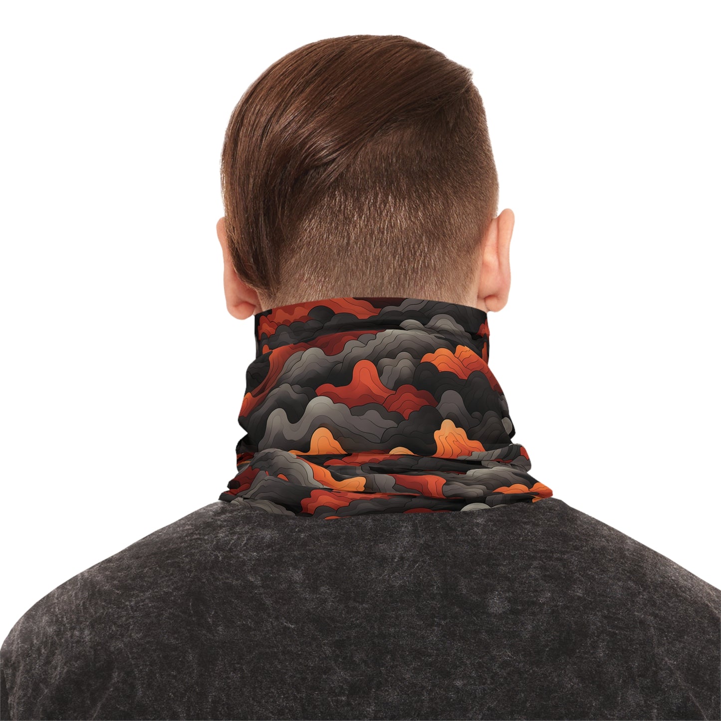 "A bold tiling pattern of angular, zig-zagging lines suggesting flames in red and orange tones overlaid on clouds of gray and black smoke" - Lightweight Neck Gaiter