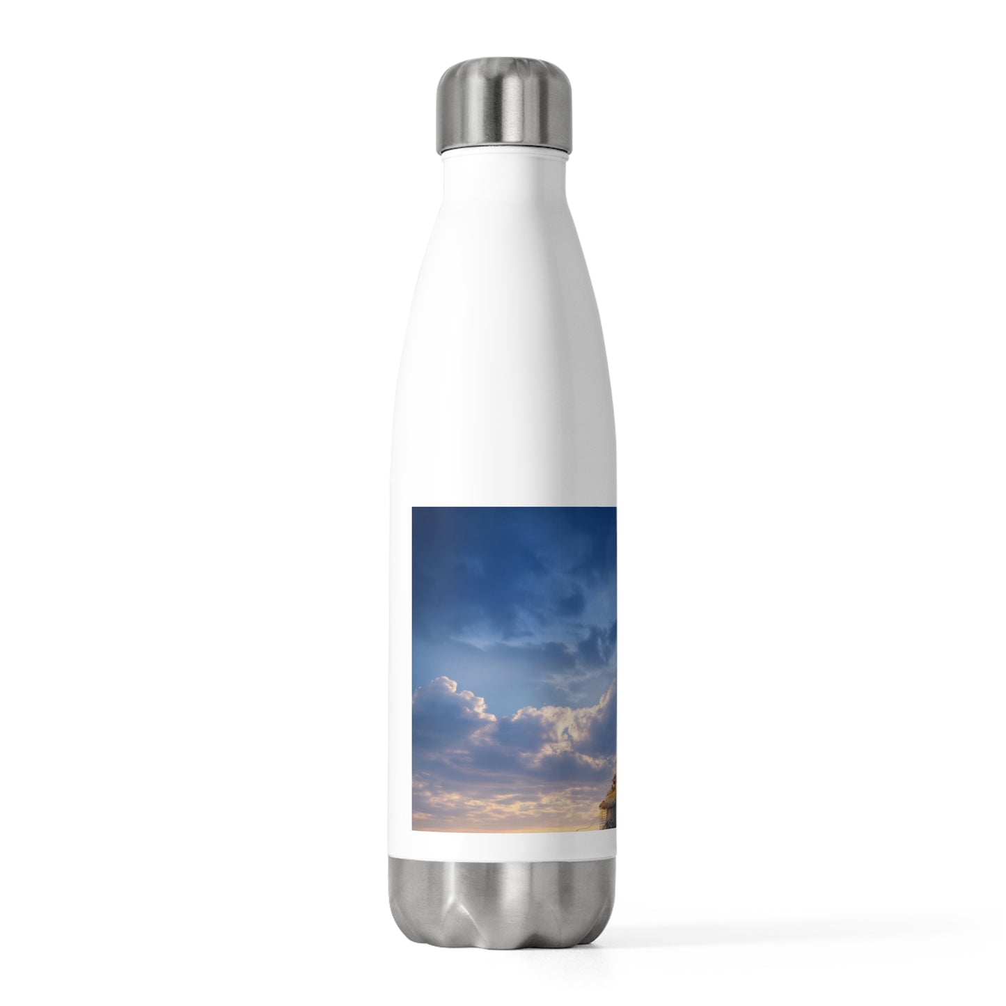 Skyborne Lighthouse Bottle – Warm Glow Against Dusk Horizon