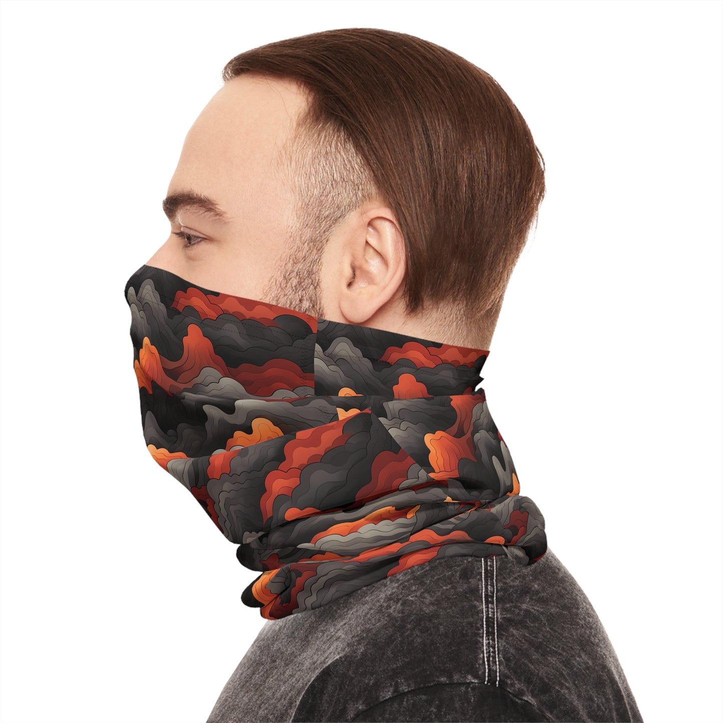 "A bold tiling pattern of angular, zig-zagging lines suggesting flames in red and orange tones overlaid on clouds of gray and black smoke" - Lightweight Neck Gaiter