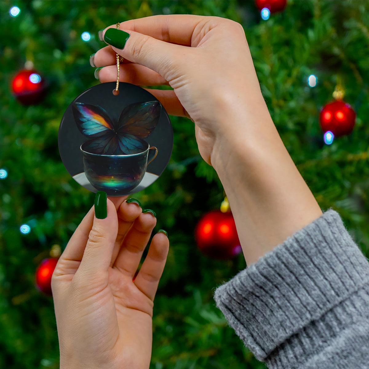 an iridescent teacup with rainbow butterfly wings behind it - Ceramic Ornament, 4 Shapes