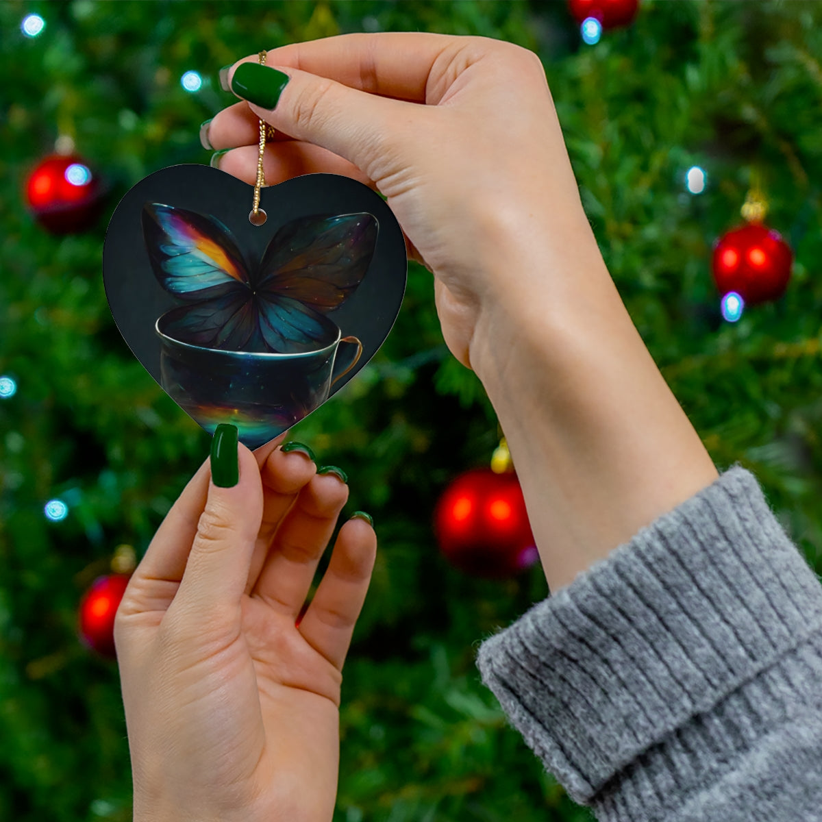 an iridescent teacup with rainbow butterfly wings behind it - Ceramic Ornament, 4 Shapes