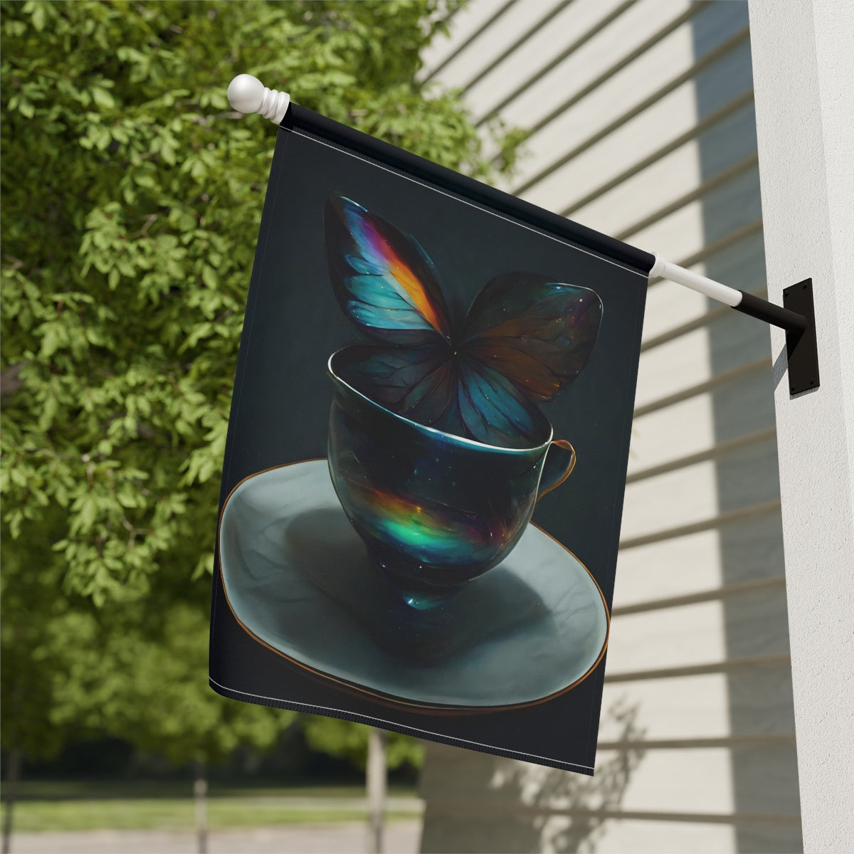 an iridescent teacup with rainbow butterfly wings behind it