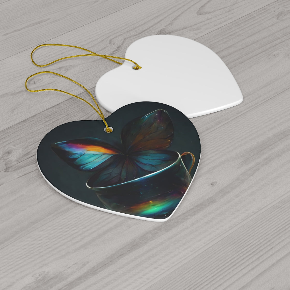 an iridescent teacup with rainbow butterfly wings behind it - Ceramic Ornament, 4 Shapes